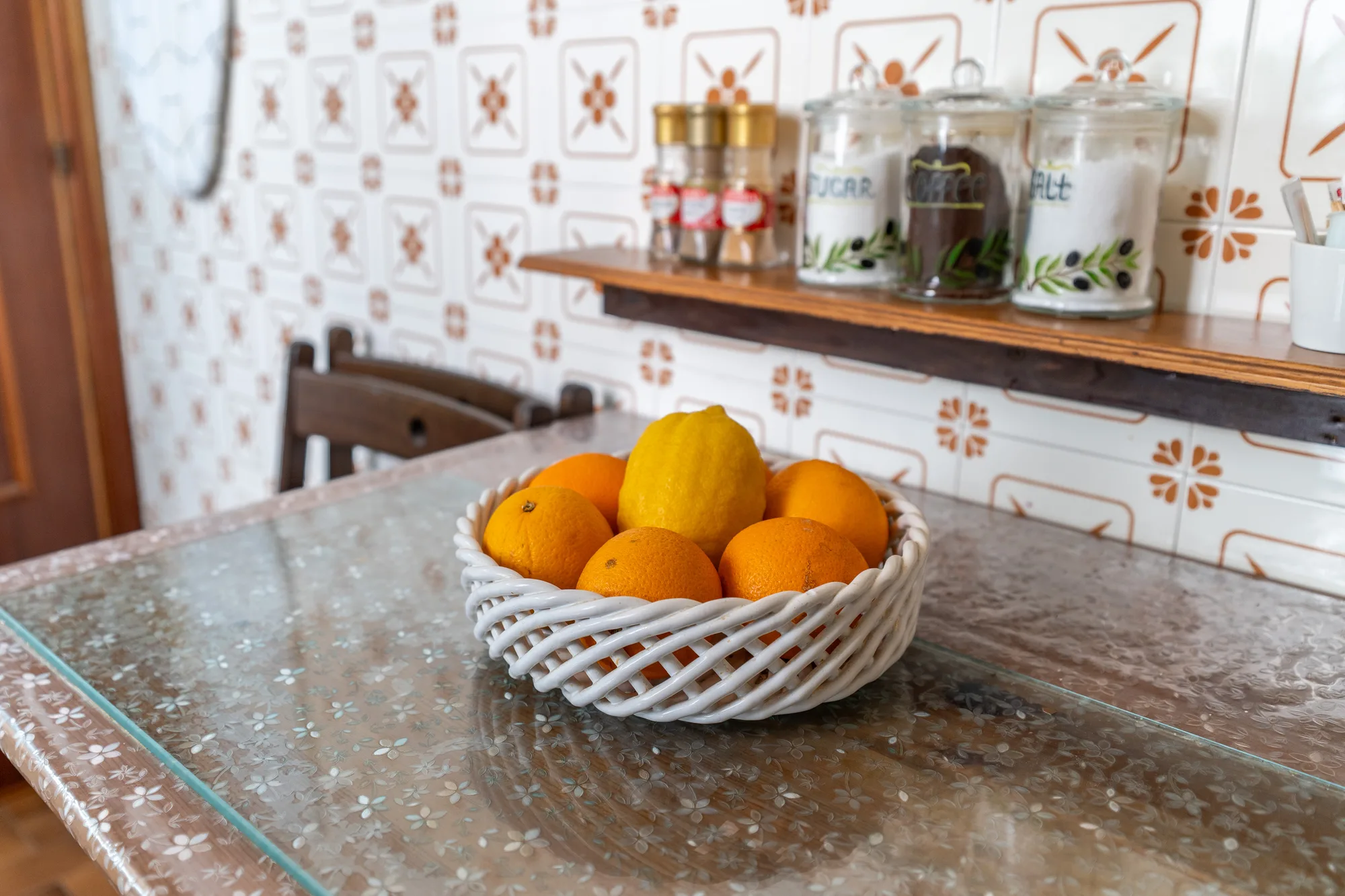 Fruit bowl and shelf detail adding hospitality warmth - interior photography on the Amalfi Coast by Cinereo